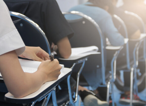 Hands,University,Student,Holding,Pen,Writing,/calculator,Doing,Examination,/